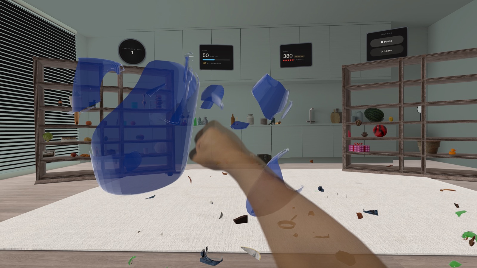 A blue glass jug bursting on a fist